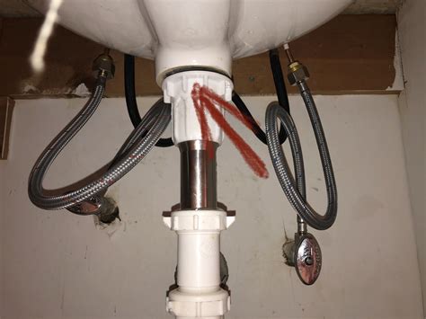 Bathroom Sink Leaking from Underneath: Causes and Fixes